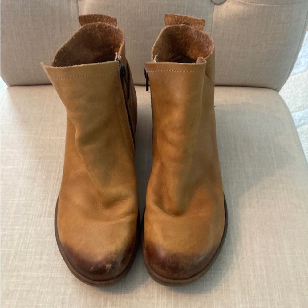SOLD Fly London tan leather booties.